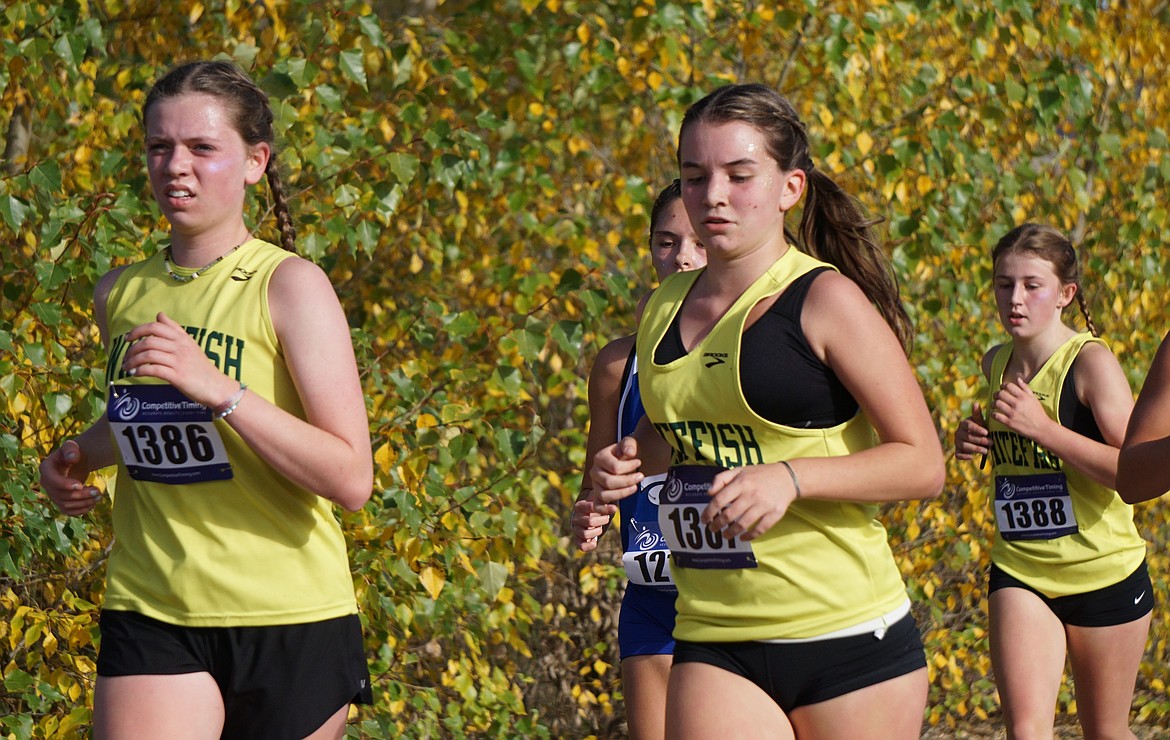 A trio of Lady Bulldogs vie for position Saturday in Frenchtown. From left to right, Maren Cromie, Sophie Douglas and Sierra Gibb. (Matt Weller photo)