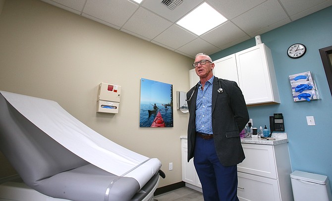 Hagadone Medical Clinic's Dr. Craig Smith is seen in a patient room. Powered by PMR Healthcare, the clinic is located in The Resort Plaza Shops so employees have quick and private access to health services on site.