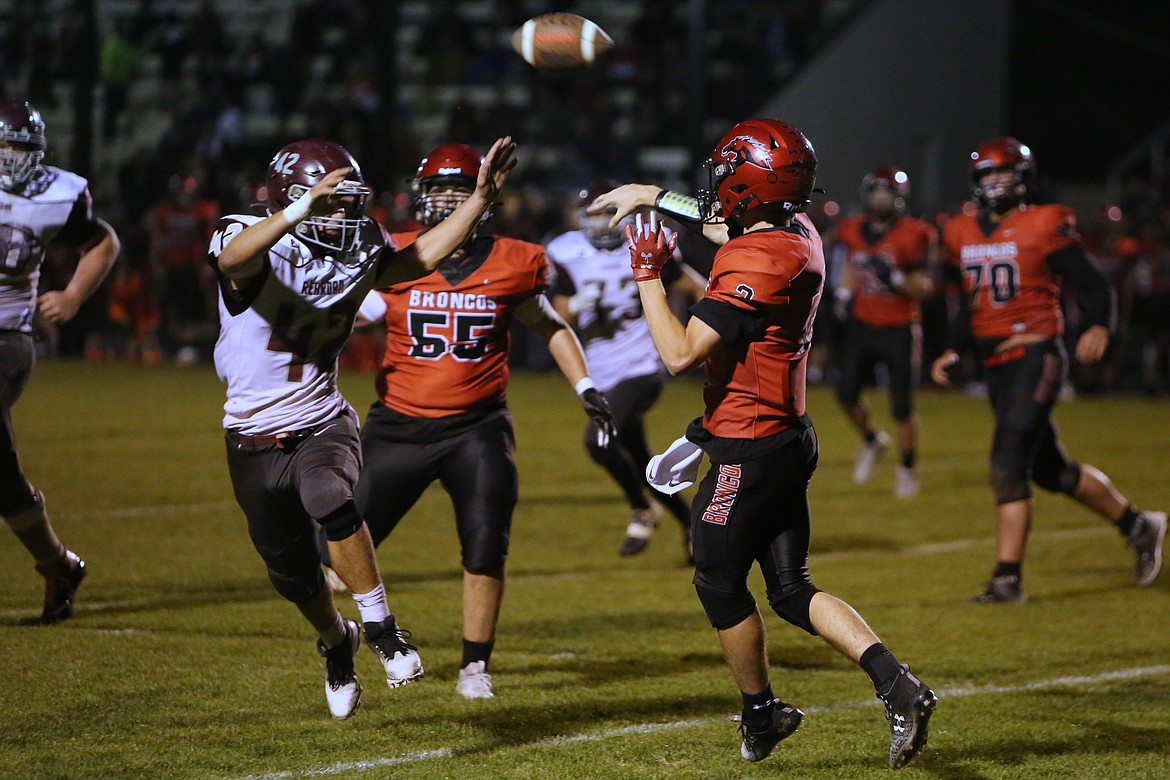 Lind-Ritzville/Sprague junior Zach Klein, right, passes the ball downfield.