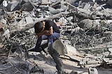 Israel will let Egypt deliver some aid to Gaza, as doctors struggle to treat hospital blast victims