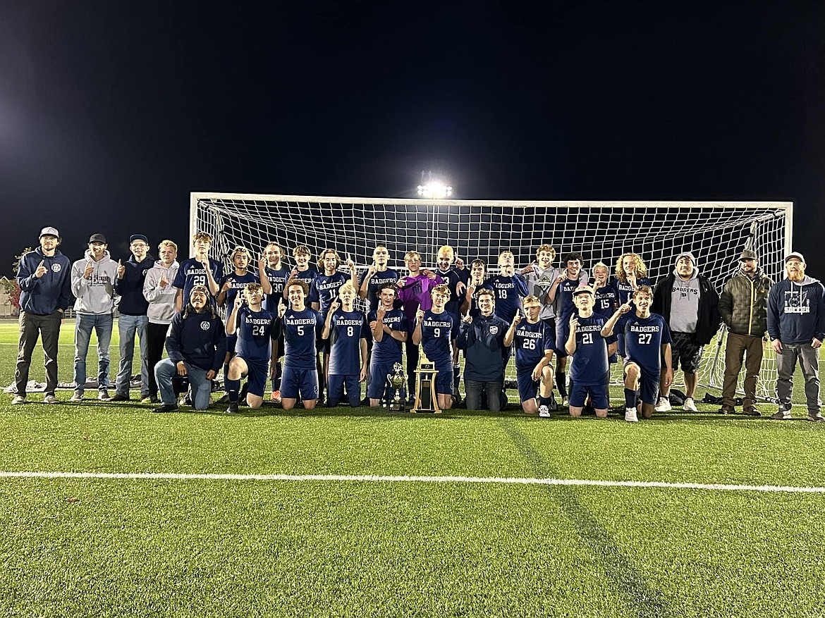 Badge boys soccer wins league and districts.