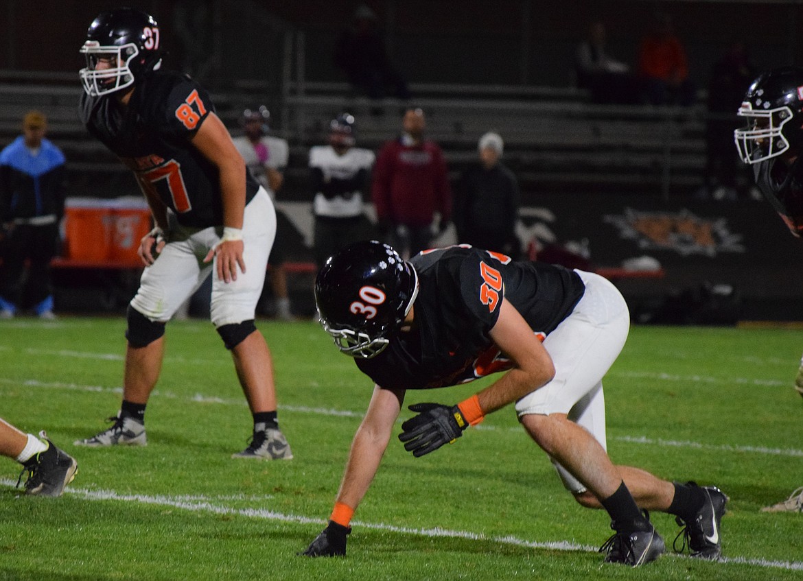 Ephrata seniors Tucker Cobb (30) and Jaxon Elliott (87) line up before a play against Grandview on Friday.