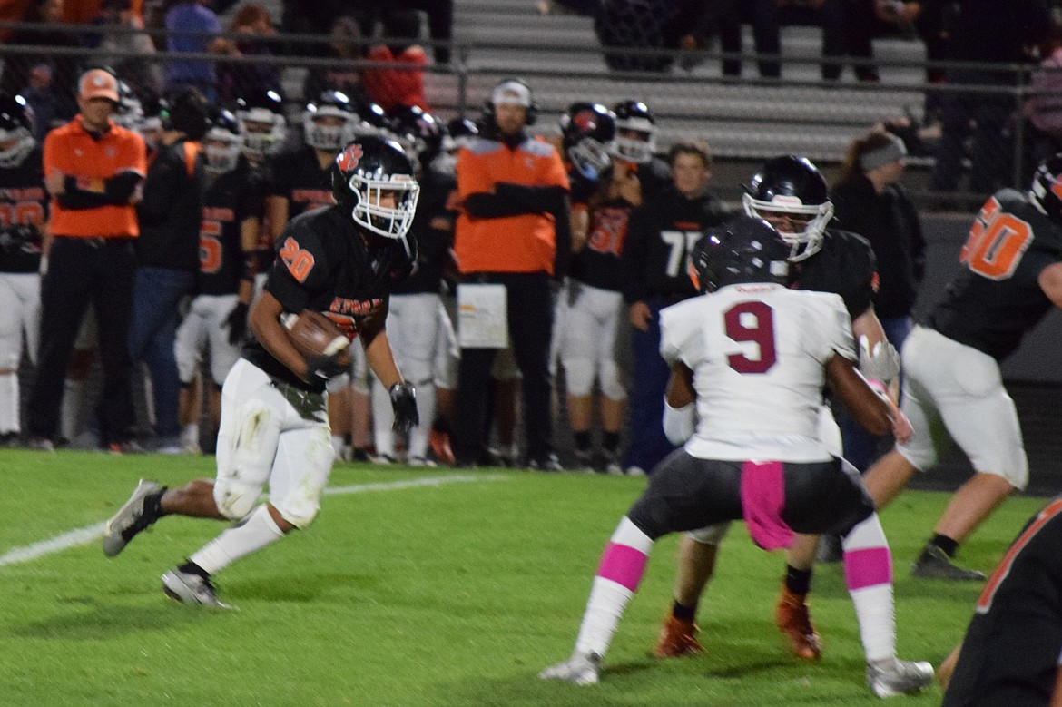 Ephrata junior Elijah Chavez-Mabry carries the football against Grandview.