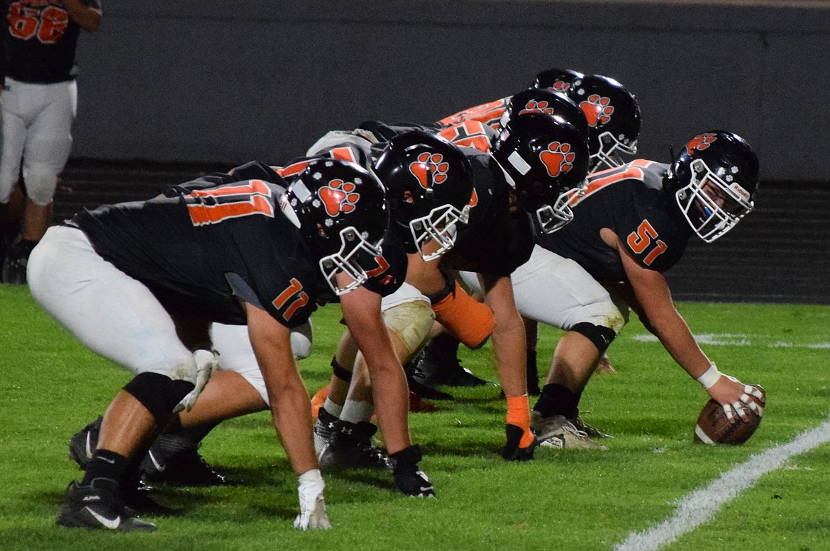 The Tiger offensive line gets set up for a play in the first half against Grandview.