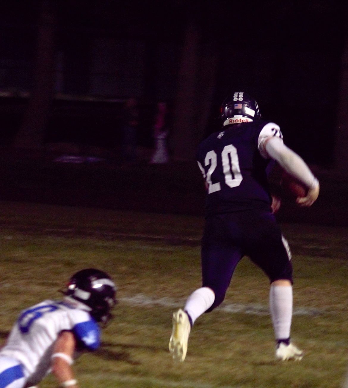 #20 Trey Bateman beats the defense and scores a touchdown for Bonners Ferry at Homecoming on Oct. 13.