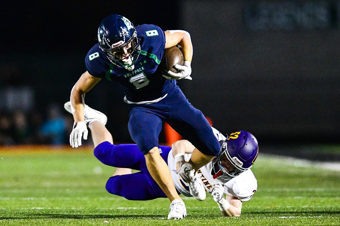 Glacier wide receiver Evan Barnes (8) picks up yardage after a reception in the first quarter against Missoula Sentinel at Legends Stadium on Thursday, Oct. 19. (Casey Kreider/Daily Inter Lake)