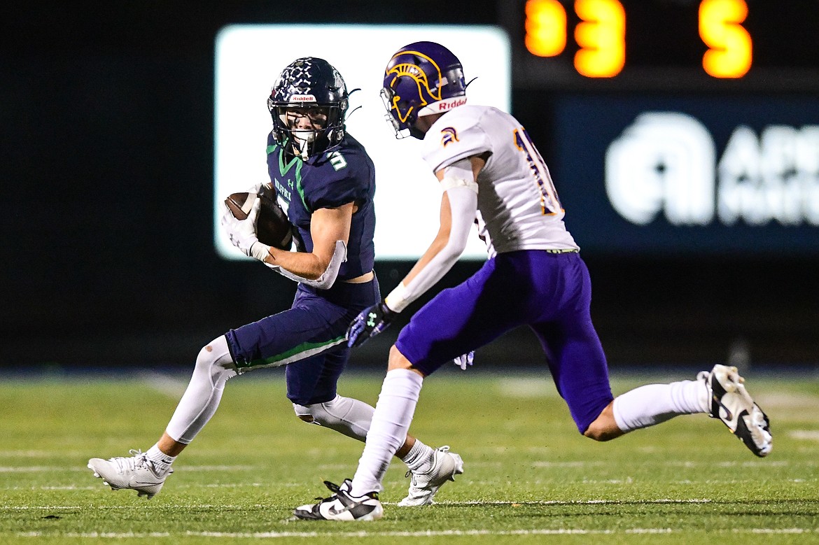 Glacier wide receiver Alex Hausmann (3) picks up yardage on a reception in the fourth quarter against Missoula Sentinel at Legends Stadium on Thursday, Oct. 19. (Casey Kreider/Daily Inter Lake)