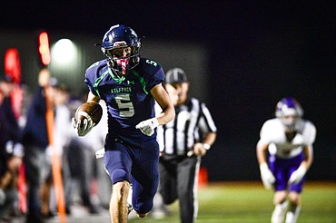 Glacier wide receiver Bridger Smith (5) takes a 39-yard touchdown reception to the end zone in the third quarter against Missoula Sentinel at Legends Stadium on Thursday, Oct. 19. (Casey Kreider/Daily Inter Lake)