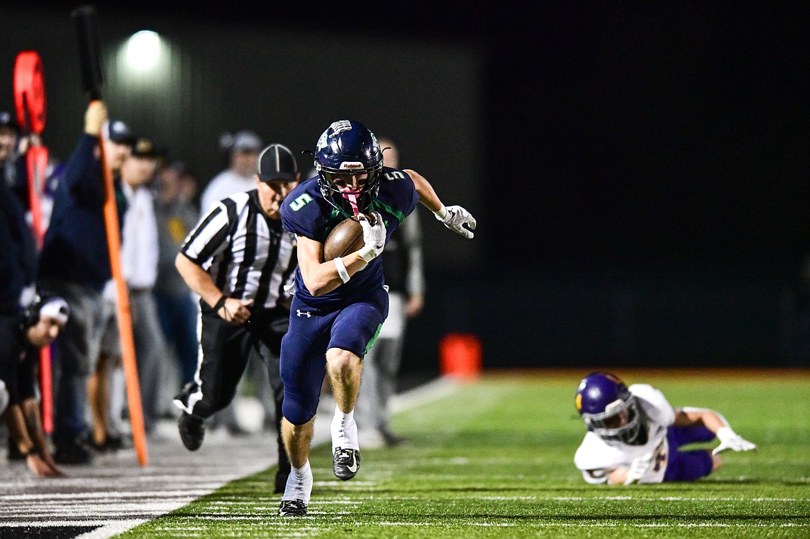 Glacier wide receiver Bridger Smith (5) takes a 39-yard touchdown reception to the end zone in the third quarter against Missoula Sentinel at Legends Stadium on Thursday, Oct. 19. (Casey Kreider/Daily Inter Lake)