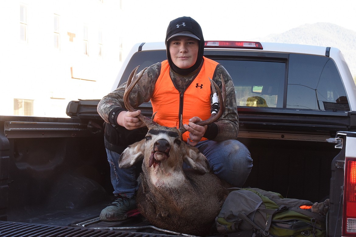 Fourteen-year-old Libby resident William Escudero was hunting with his mom, Aimee Escudero, Thursday morning when he bagged this 4x4 mule deer buck with a Remington 30-06 in Lincoln County. William said it was his fourth career deer, but his first buck on the first day of the season. Thursday and Friday were Montana's Youth Deer-Only Hunt days. (Scott Shindledecker/The Western News)