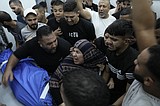 Gaza awaits humanitarian aid, as Israel tells troops to ‘be ready’ for ground invasion