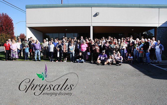 Clients and families of Chrysalis at 280 W. Prairie Ave. (Suite 3), a Developmental Disability Agency (DDA), celebrate at the open house.