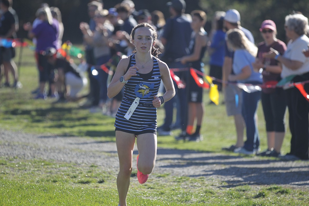 JASON ELLIOTT/Press
Coeur d'Alene sophomore Olivia May enters in final few meters of Thursday's 5A Region 1 cross country race at Farragut State Park in Athol.