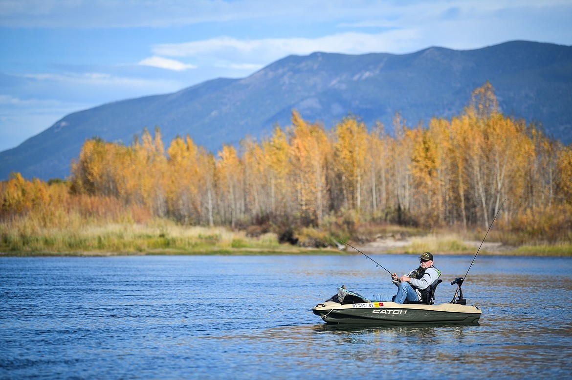 Steve Haag casts a line into the Flathead River from a fishing kayak on Wednesday, Oct. 18. (Casey Kreider/Daily Inter Lake)