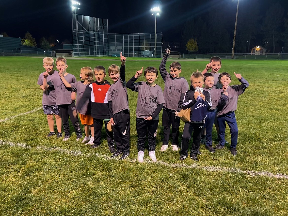 Courtesy photo
Ironman Safe went undefeated in the 2nd/3rd grade Coeur d'Alene Parks and Recreation flag football league. From left are Marshall Penn, Caden Bennett, Kenny Noble, Titus Sanborn, Sullivan Wessel, Lincoln Nelson, Xander Finnegan, Royce Sanborn, Reid Jachetta, Jackson Peterson (back) and Easton Jachetta. Not pictured are coaches Greg Stern and Chase Bennett.