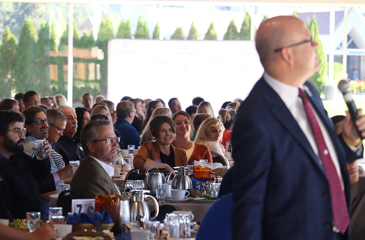 The crowd listens to Secretary of State Phil McGrane during a Coeur d'Alene Regional Chamber luncheon at the Hagadone Event Center on Thursday.