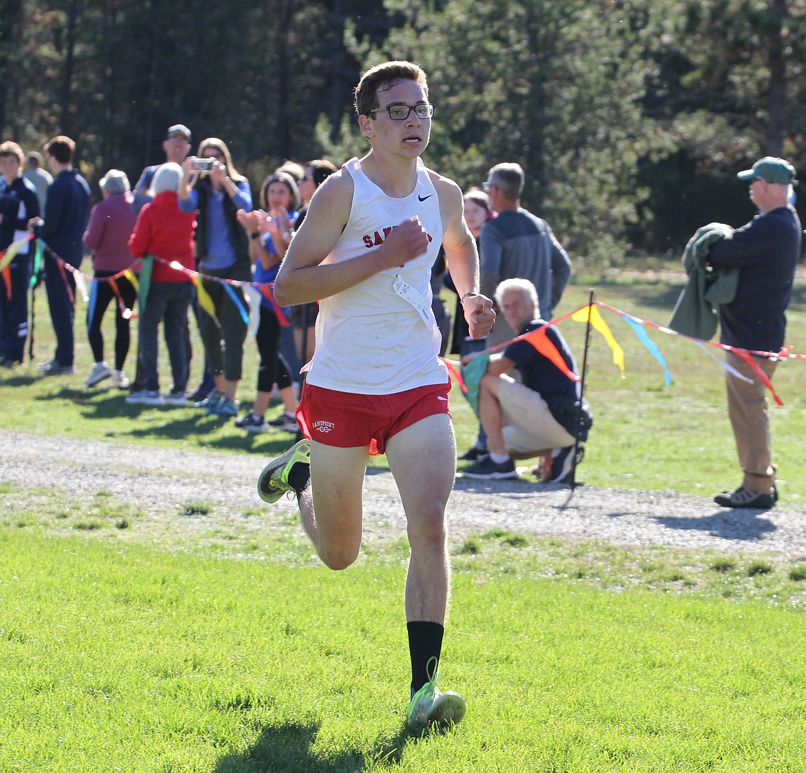 Sandpoint senior Nathan Roche nears the finish line at the 4A IEL District Championship held at Farragut State Park on Thursday. Roche won the individual district title with a time of 16:43.1. Sandpoint captured their 11th consecutive district title.