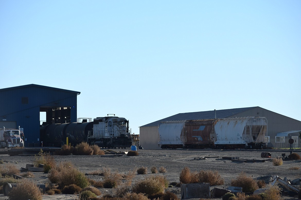 A train sits on a rail line in the Port of Warden on the west side of town next to Viterra’s oilseed processing facility.