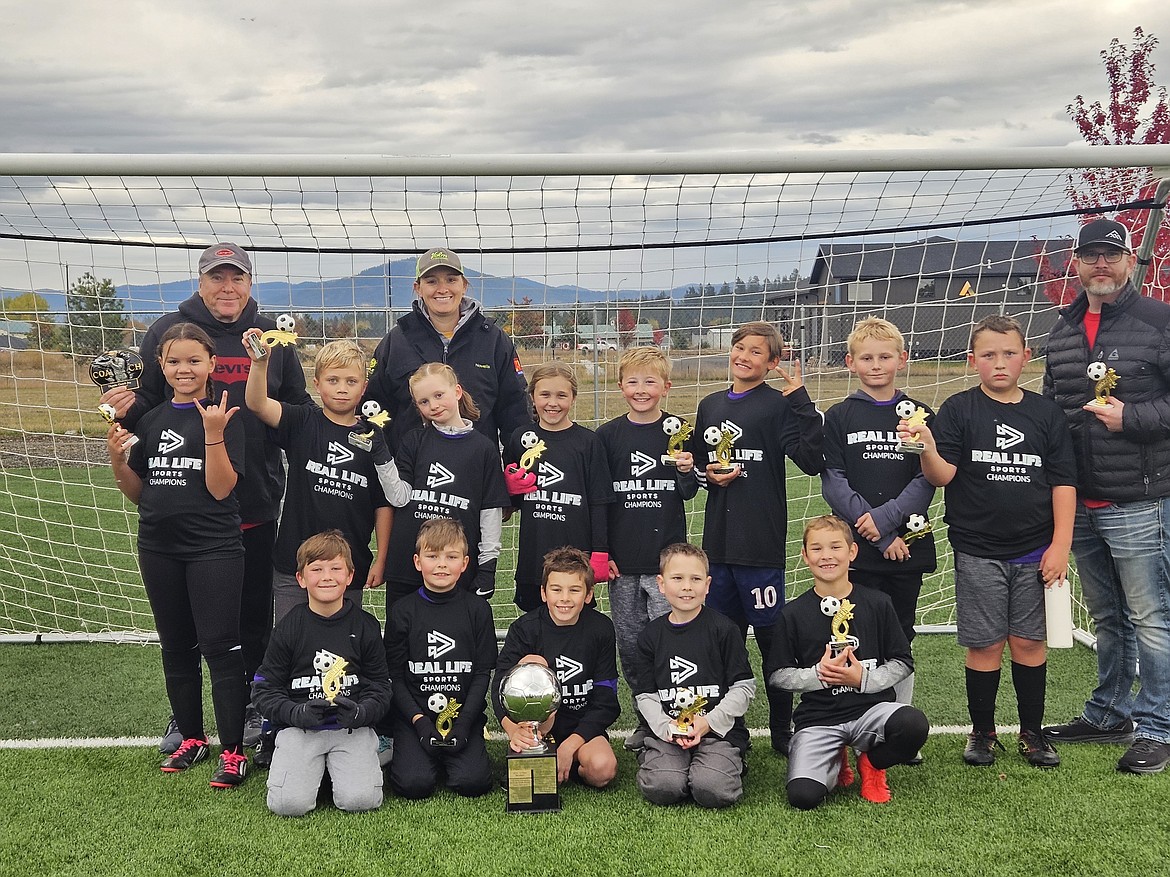 Courtesy photo
The Super Cannons won the 3rd/4th-grade championship in Real Life soccer. In the front row from left are Mason Pentis, Owen Lokken, Charlie Bruzas, Torin Wilder and Frankie Rogers; and back row from left, coach Rich Joy, Knova Toney, Gabe Edman, coach Megan Durfey, Emma Slack, Kinzley Monnie-Mohr, Casen McBroom, Jack Rogers, Brayden Grimm, Clayton Durfey and coach Kyle Wilder.