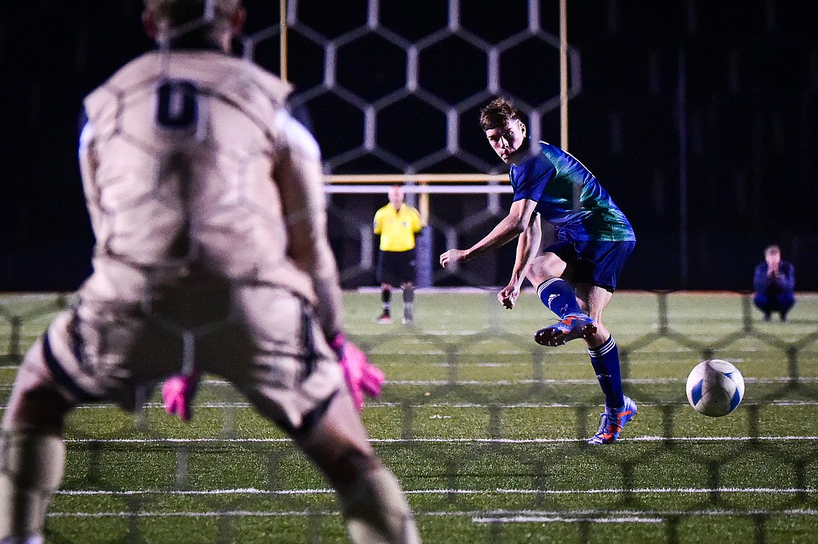 Glacier's Caleb Brannan (8) scores in the overtime round of penalty kicks against Billings West at Legends Stadium on Friday, Oct. 20. (Casey Kreider/Daily Inter Lake)