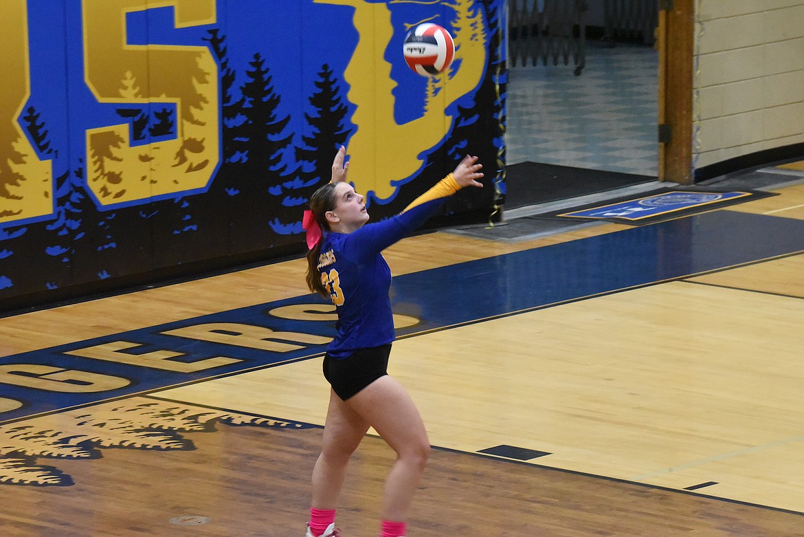 Libby's Addy Gilden-Vincent serves against Bigfork during their match on Thursday, Oct. 19. (Scott Shindledecker/The Western News)