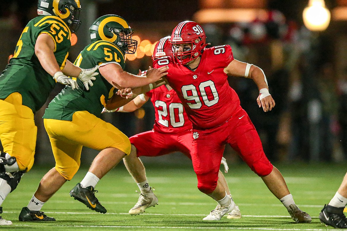 Sandpoint defensive lineman Tyson Hodges fights hard on the line during Friday's game against the Lethbridge Collegiate Institute.