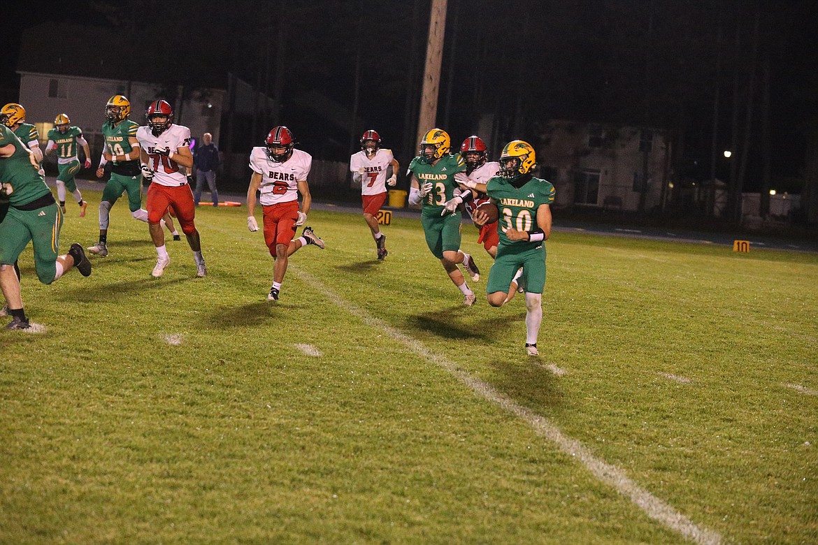 JASON ELLIOTT/Press
Lakeland sophomore fullback Peyton Sardinha gets to the corner during the third quarter of Friday's 4A Inland Empire League game against Moscow at Corbit Field in Rathdrum.