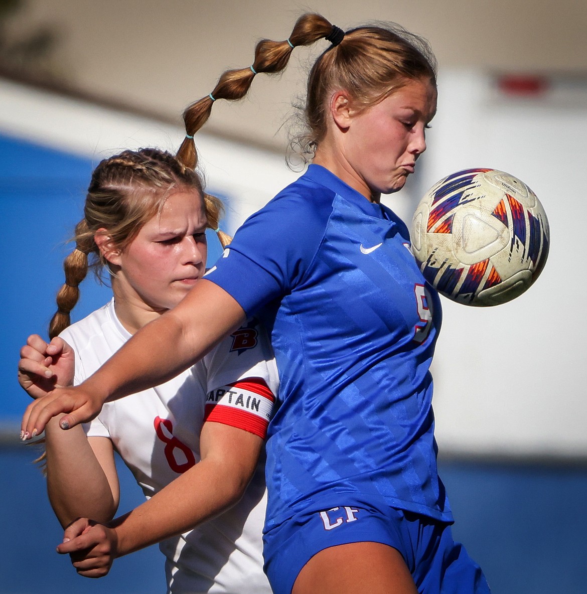 The Wildkats' Hope McAtee keeps the ball from Bigfork's Danika Bucklin during State A semifinal soccer action in Columbia Falls Saturday, October 21. (Jeremy Weber/Bigfork Eagle)