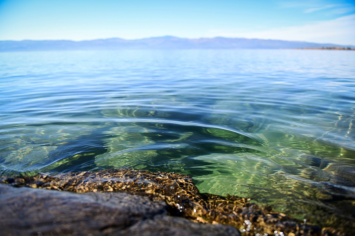 The clear waters of Flathead Lake ripple along the rocky shoreline of the Wayfarers unit of Flathead Lake State Park on Friday, Oct. 20. (Casey Kreider/Daily Inter Lake)