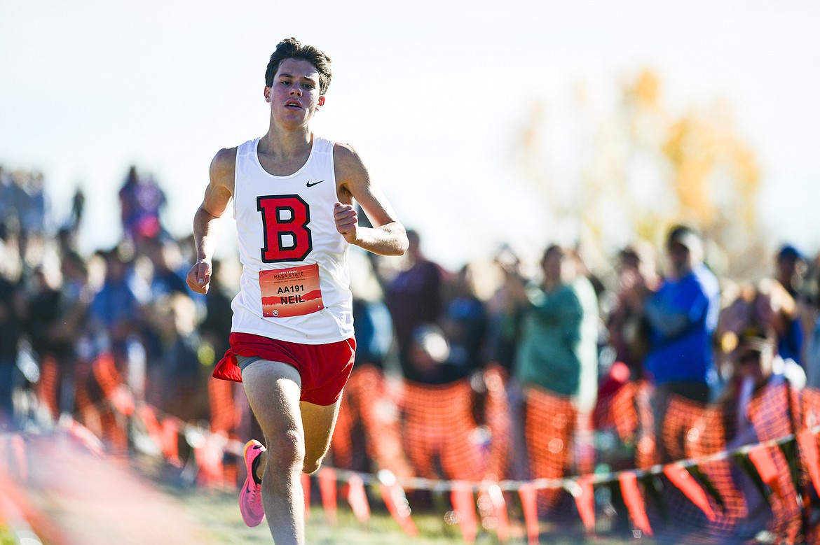 Bozeman's Nathan Neil set a new Montana state record with a time of 14:45.47 and a first-place finish in the Class AA boys at the state cross country meet at Rebecca Farm on Saturday, Oct. 21. (Casey Kreider/Daily Inter Lake)