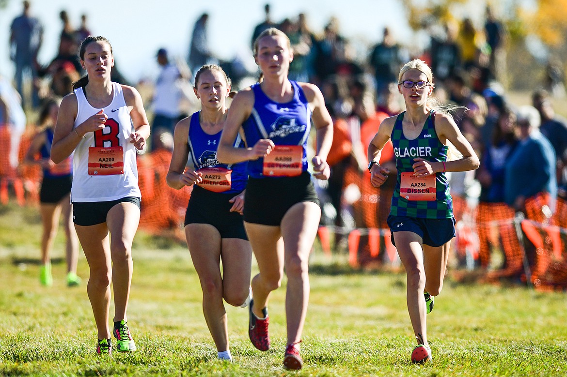 Glacier's Lauren Bissen runs the course in the Class AA girls race at the state cross country meet at Rebecca Farm on Saturday, Oct. 21. (Casey Kreider/Daily Inter Lake)