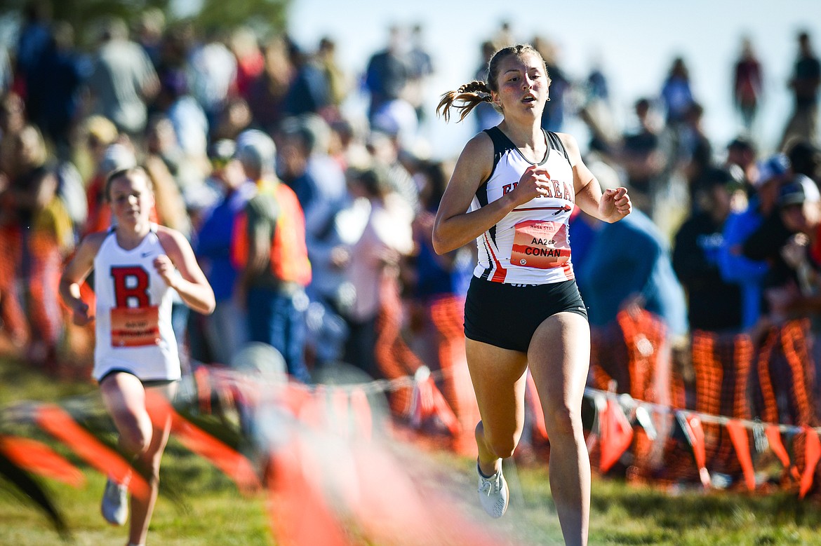 Flathead's Mikenna Conan nears the finish line in the Class AA girls race at the state cross country meet at Rebecca Farm on Saturday, Oct. 21. (Casey Kreider/Daily Inter Lake)