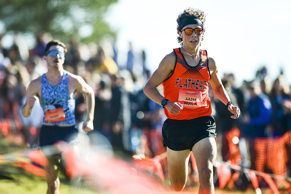 Flathead's Robbie Nuila nears the finish line in the Class AA boys race at the state cross country meet at Rebecca Farm on Saturday, Oct. 21. (Casey Kreider/Daily Inter Lake)