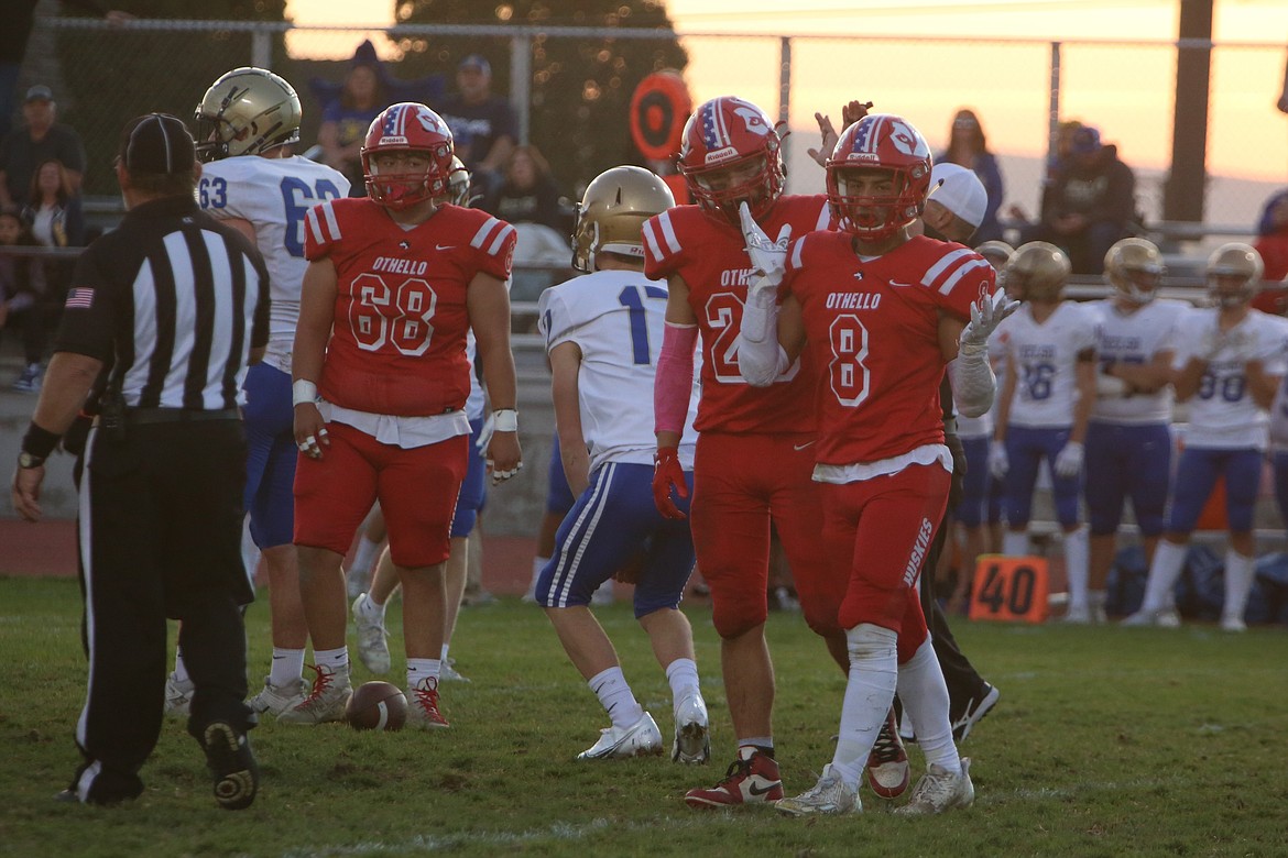 Othello senior Steven Carmona (8) celebrates after a sack in the first half against Kelso.