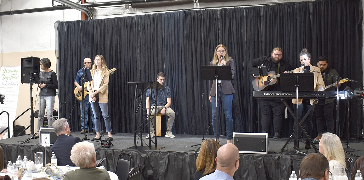 The Grant County Worship Team performs at the Crossroads Resource Center fundraiser banquet Saturday. From left: Abby Martinez, Terry Smith, Justine Friehe, Jake Courtright, Kirsten Hintz, Davie Sawyer, Emily Sawyer, and Rob Ditona.