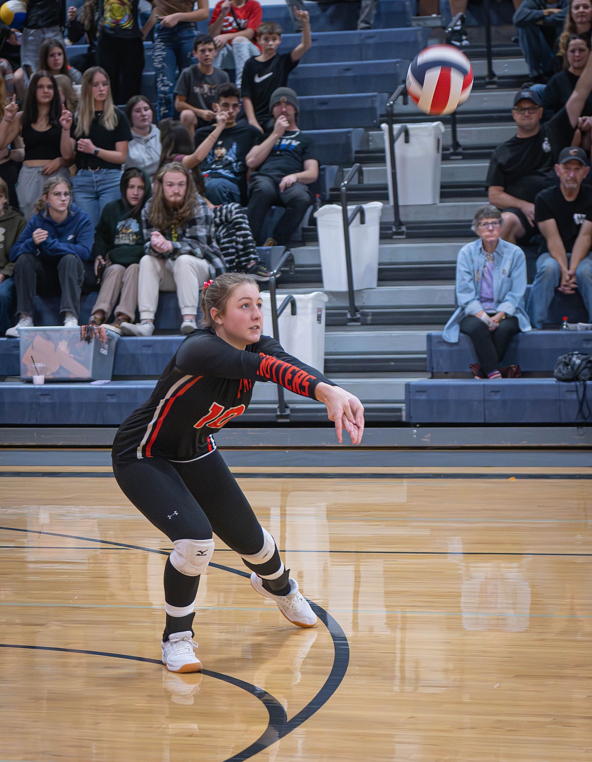Plains Trotter Blakely Lakko returns a serve against Hot Springs. (Tracy Scott/Valley Press)