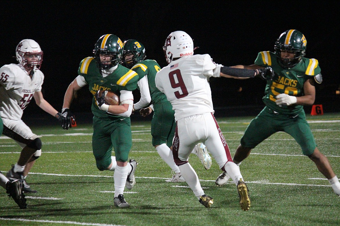 Quincy running back Jayden Richards (22) breaks free of the Medical Lake defense in Quincy’s 43-0 win Friday.