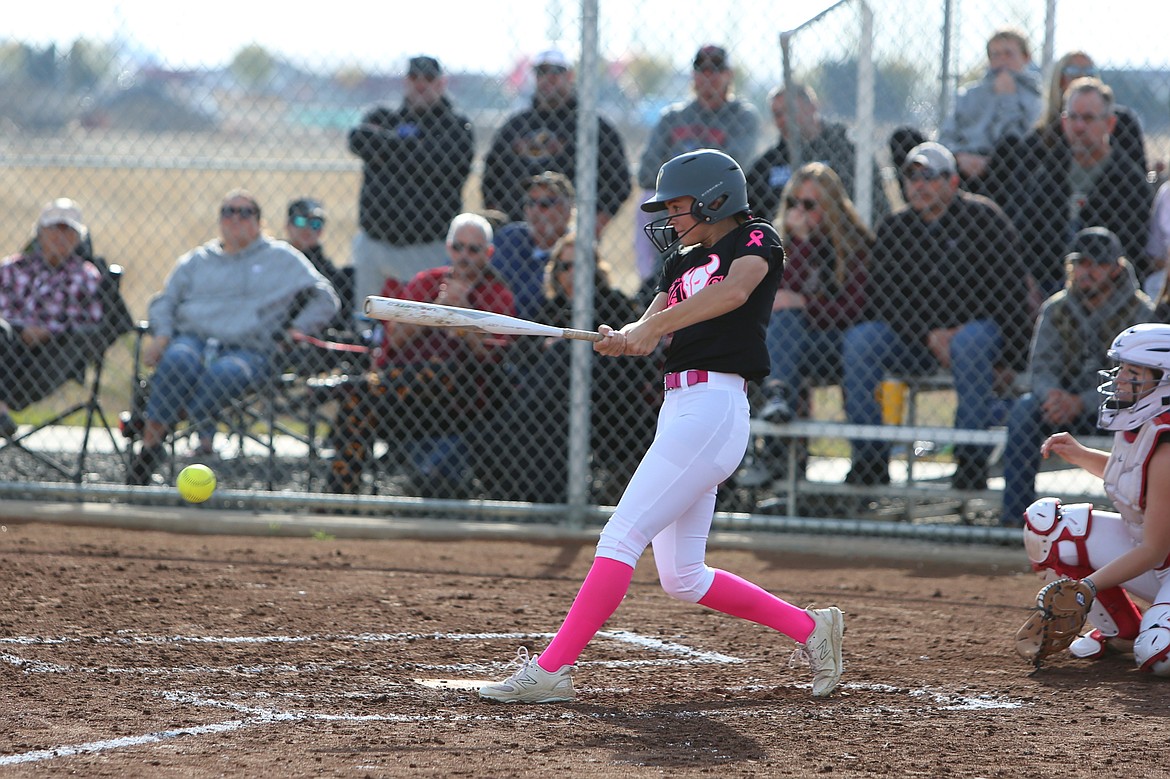 Moses Lake senior Kendall Reffett makes contact with a pitch.