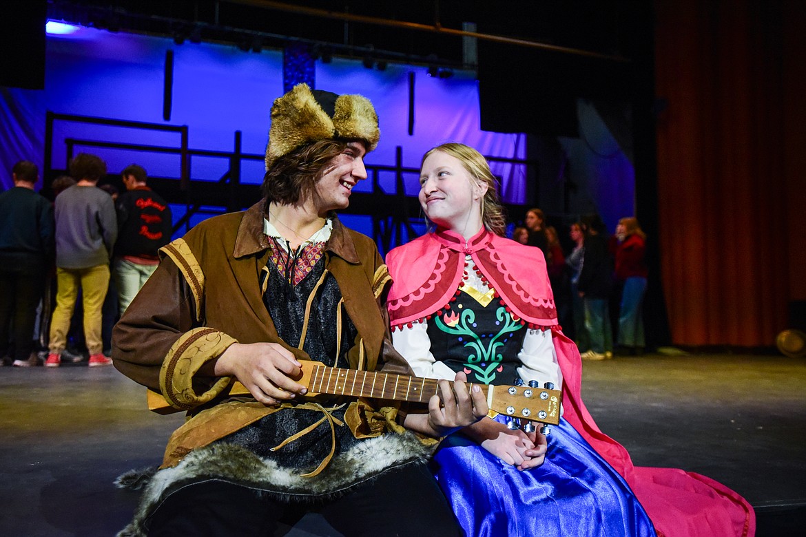 Flathead High School students Benjamin Moore, left, as Kristof, and Gracyne Johnson, as Anna, rehearse a scene from the musical "Frozen" inside the auditorium at Flathead High School on Tuesday, Oct. 24. (Casey Kreider/Daily Inter Lake)