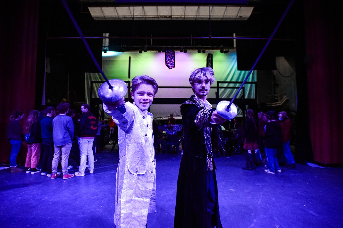 Flathead High School students Collin Olson, left, as Hans, and Ryan Kitzmiller, right, as Weselton, rehearse a scene from the musical "Frozen" inside the auditorium at Flathead High School on Tuesday, Oct. 24. (Casey Kreider/Daily Inter Lake)