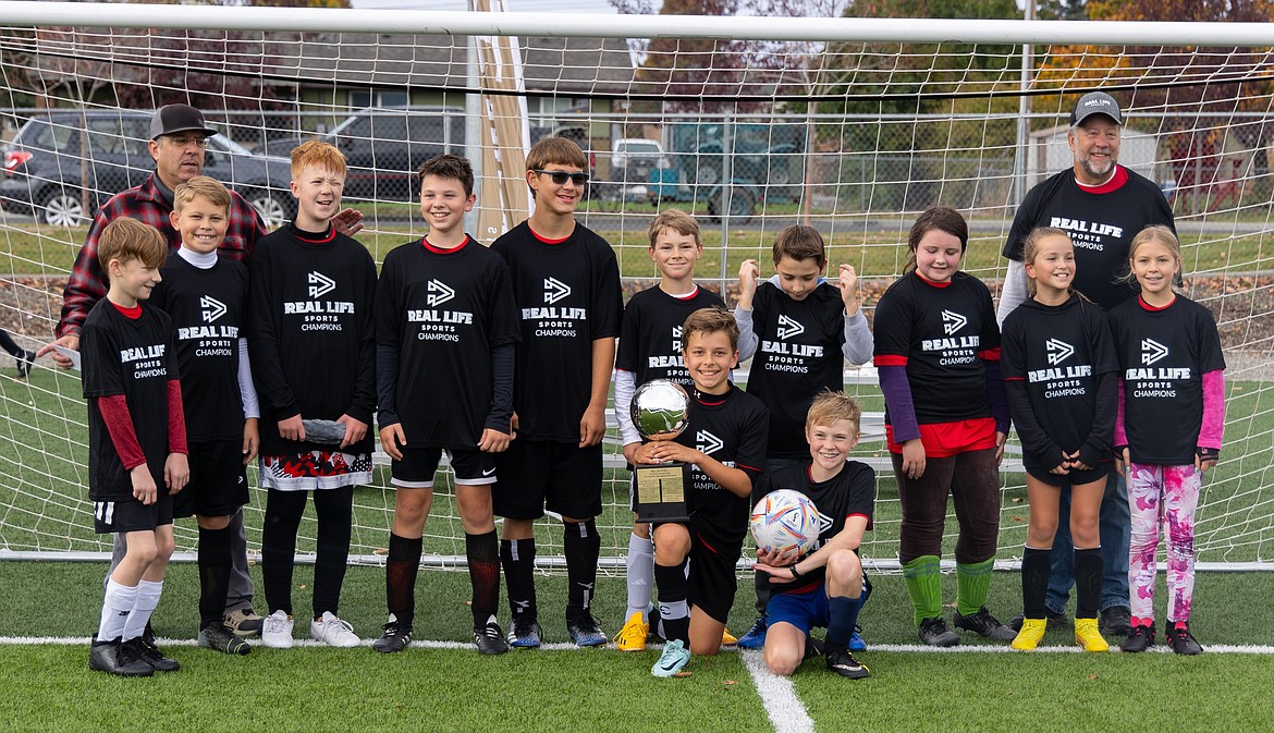 Courtesy photo
The Afterburners won the 5th/6th grade soccer championship in Real Life Sports. In the front are Kai Cardoza and Dylan Baune; second row from left, Roman Dion, Brenden Whitney, Macklin Gillis, Braden Davis, Trevor Heimbigner, Zeke Andrews, Christian Belluomini, Sarah Kearney, Lucy Meredith and and Elliot Baune; and back row from left, Chris Belluomini and Mike Lane. Not pictured is Kyla Hutchison.