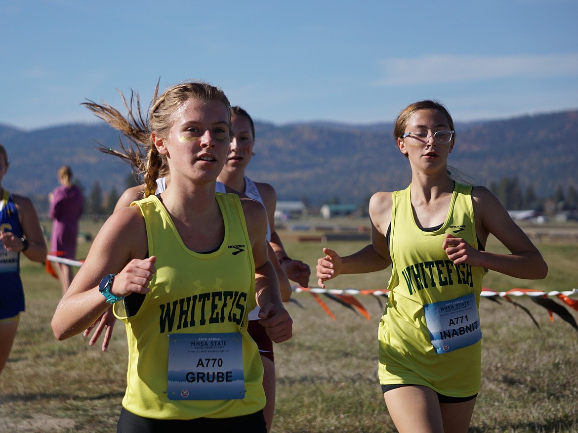 Lady Bulldogs Morgan Grube (left) and Grace Inabnit (right) settling into their pace at the MHSA State XC Championship at Rebecca Farm on Saturday. (Matt Weller photo)