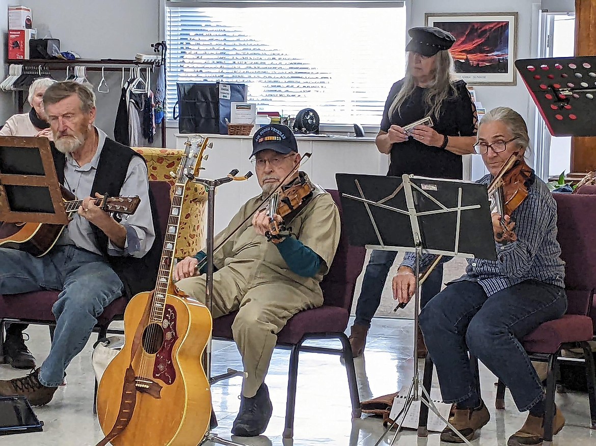 Members of the local District 1A chapter of the Idaho Old-Time Fiddlers Association are pictured at a past jam session. The group will be hosting another event at 2 p.m. Saturday, Oct. 28, at the Sandpoint Senior Center.