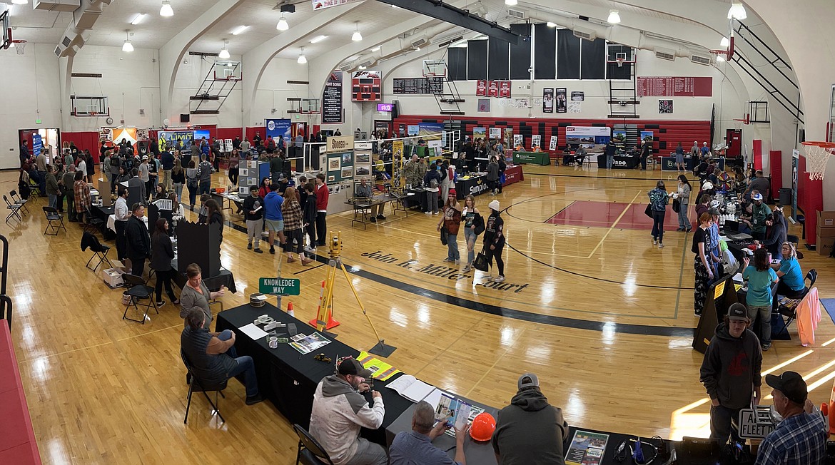 A wide-angle photo shows high school students speaking with local businesses and walking around the Lind-Ritzville gym during Thursday’s 2023 Lind-Ritzville and Washtucna Career Showcase.