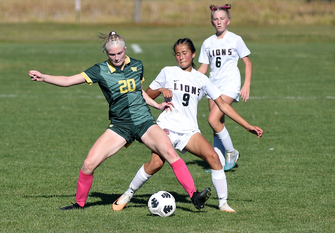 Whitefish senior Isabelle Cooke battles for position against Lockwood in the State A semifinal match at Whitefish on Saturday, Oct. 21. (Matt Baldwin/Whitefish Pilot)