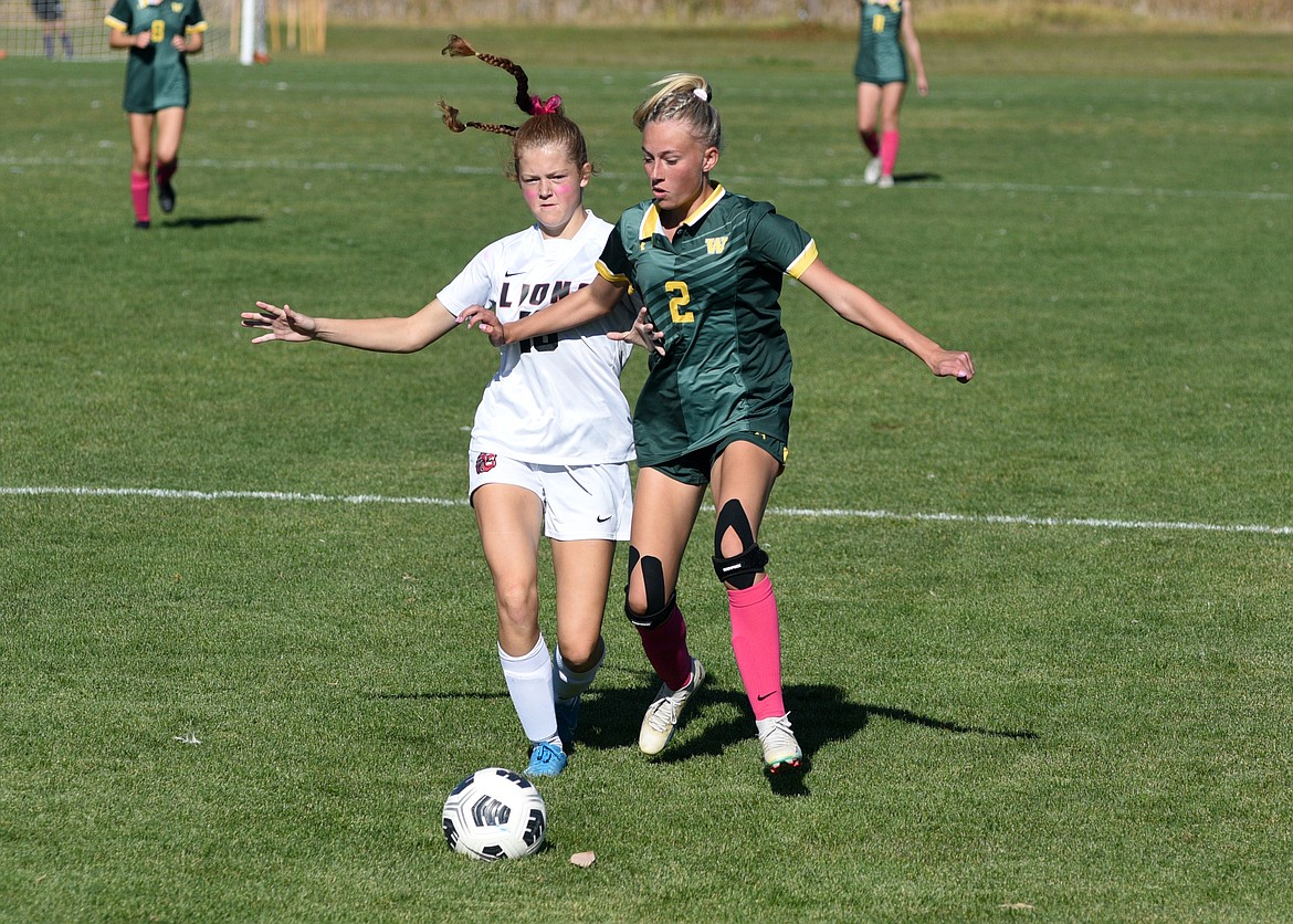 Whitefish junior Brynn Morse goes to the net against Lockwood in the State A semifinal match at Whitefish on Saturday, Oct. 21. (Matt Baldwin/Whitefish Pilot)