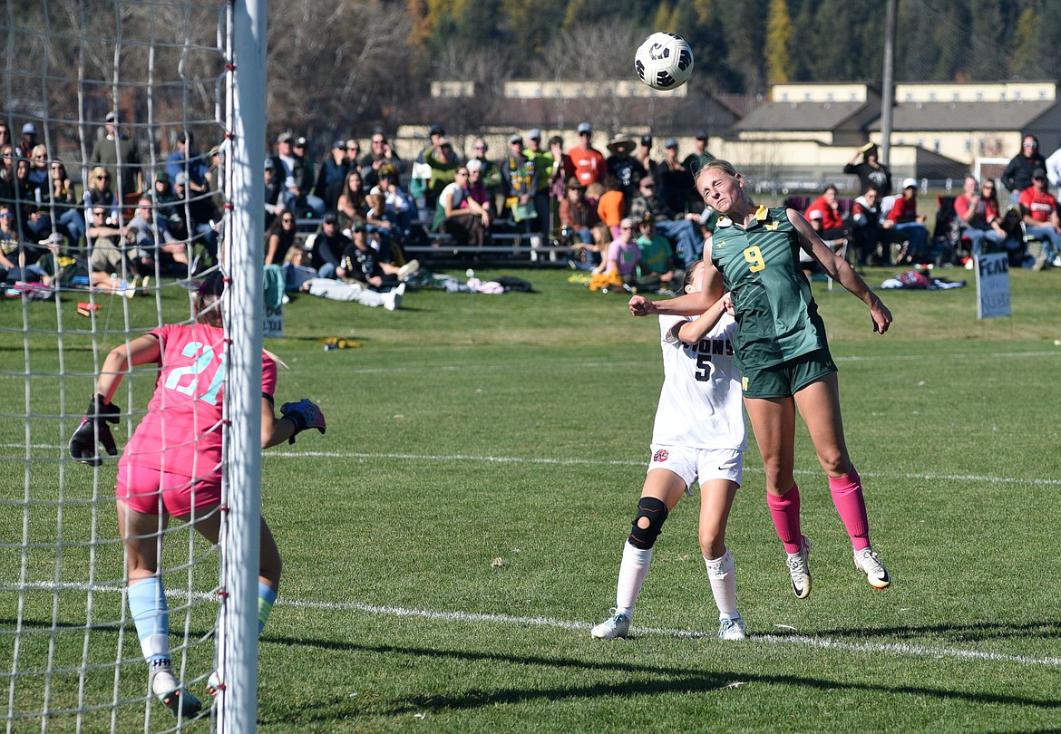 Whitefish junior Delaney Smith soars for a header against Lockwood in the State A semifinal match at Whitefish on Saturday, Oct. 21. (Matt Baldwin/Whitefish Pilot)