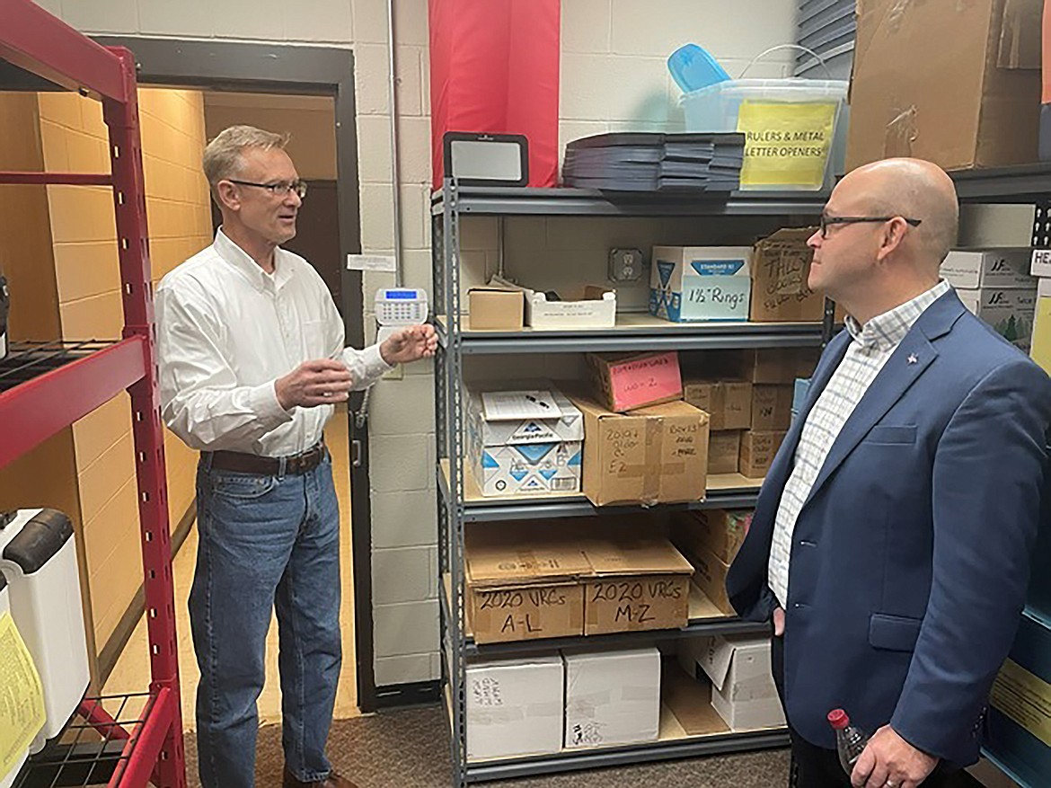 Bonner County Clerk Mike Rosedale talks to Phil McGrane, Idaho Secretary of State, during a recent visit to discuss the upcoming election on Nov. 7 and to see if the region's county clerk need anything.