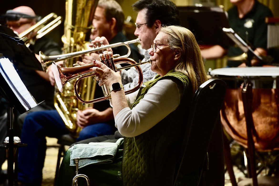 Betty Visocan plays the trumpet during the Flathead Valley New Horizons Band concert Oct. 19 at the Red Lion in Kalispell. (Heidi Desch/Daily Inter Lake)