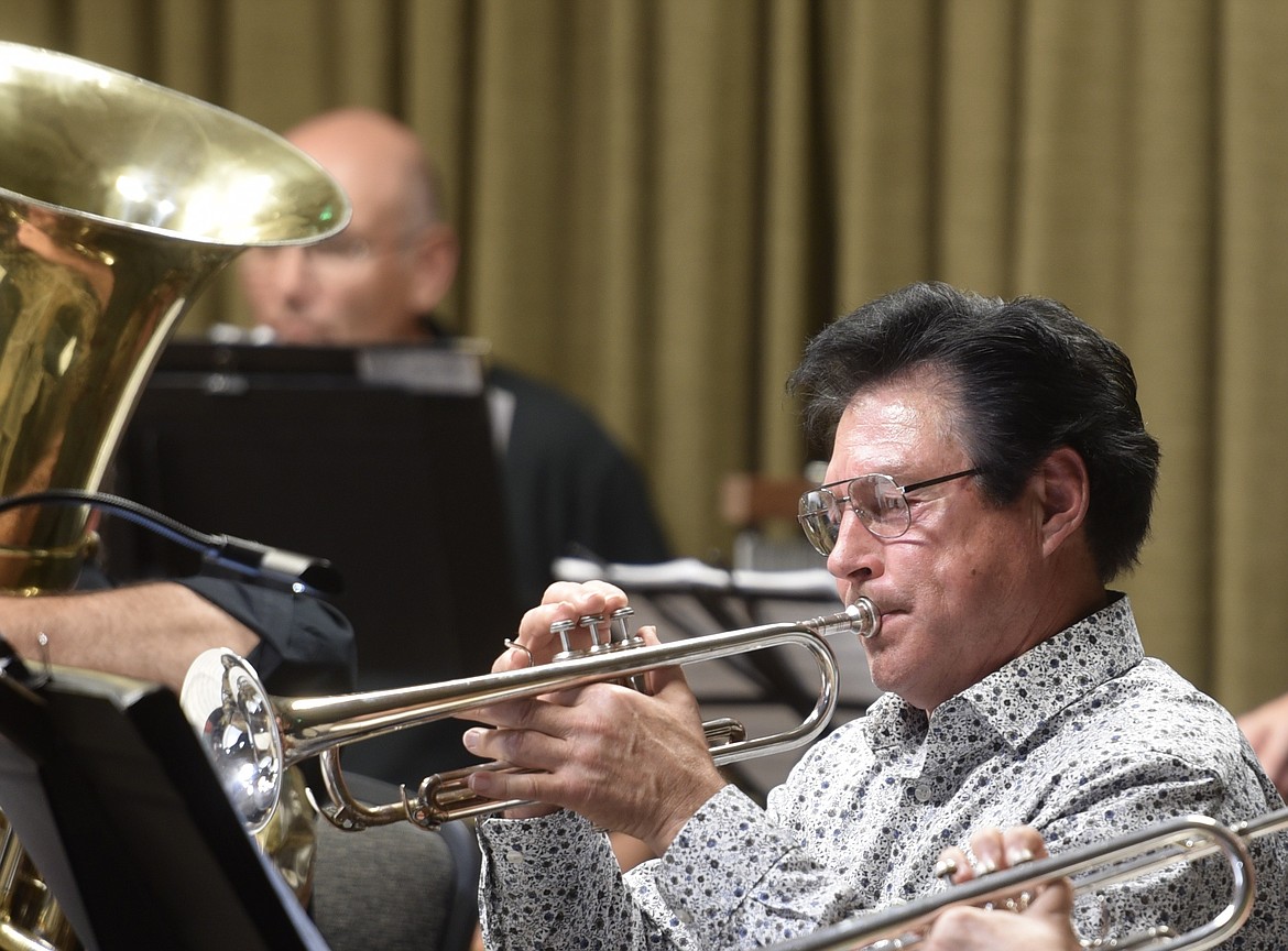 Kurt Reimer plays the trumpet during the Flathead Valley New Horizons Band concert Oct. 19 at the Red Lion in Kalispell. (Heidi Desch/Daily Inter Lake)